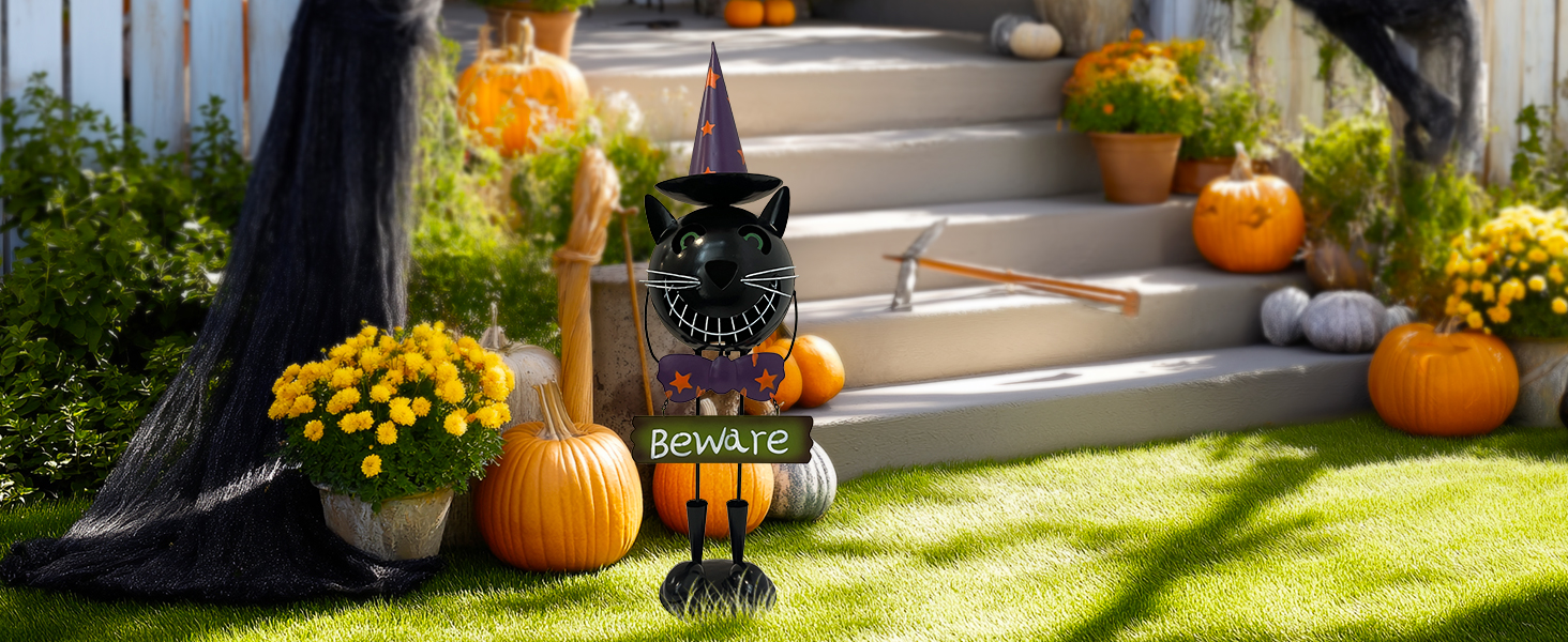 black cat statue decor in a garden