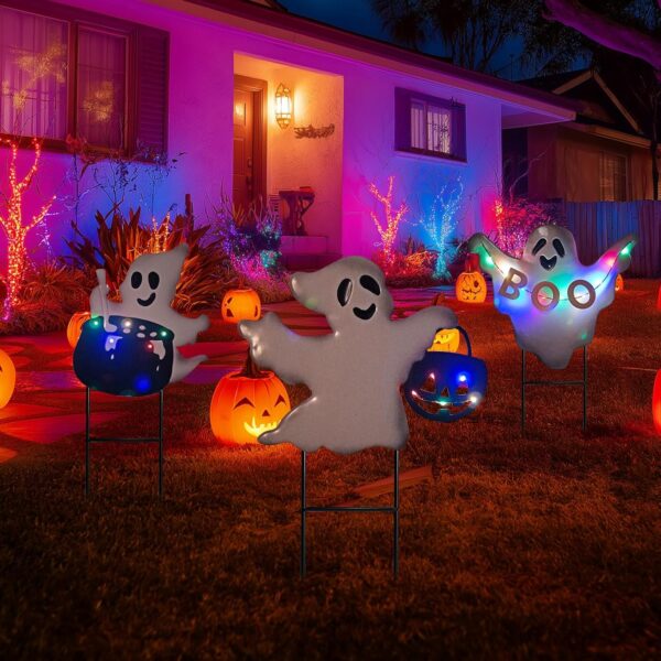 front yard with three ghost garden stakes